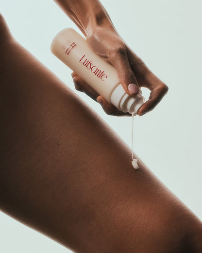 Luisante Brightening Body Serum being applied to skin for hydration and nourishment